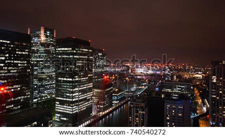 Aerial night photo from iconic Canary Wharf skyline, Docklands, Isle of Dogs, London, United Kingdom