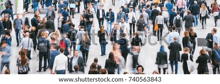 large crowd of anonymous people Royalty-Free Stock Photo #740563843
