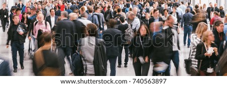 blurred large crowd of business people