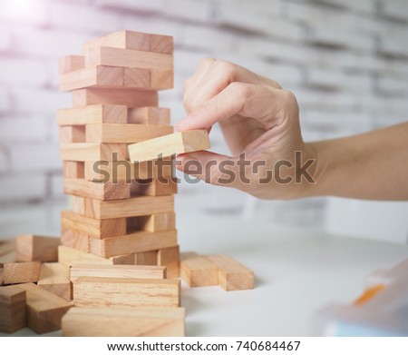 wooden block Planning, risk and strategy of project management in business, with hand pull wood block