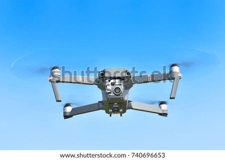 Compact drone in flight