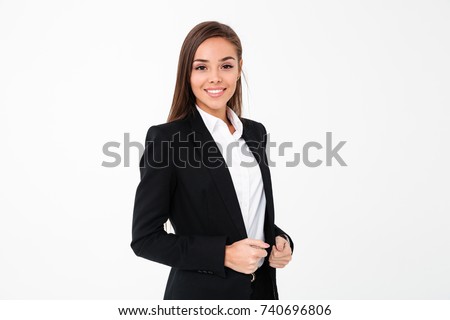 Picture of gorgeous cheerful business woman standing isolated over white background. Looking camera.