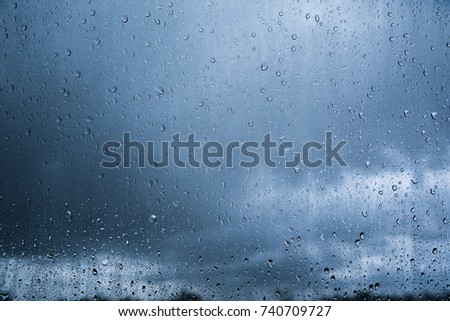 Rain drop on glass, Water drop background on glass with rainy