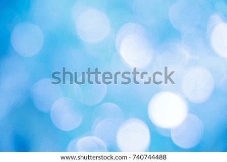 Blue and white bokeh background from natural forest