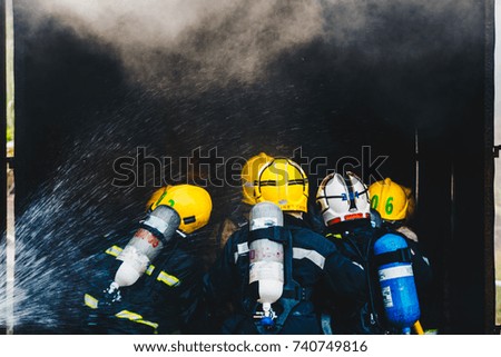 Teamwork Of Firefighters Training ,Fireman