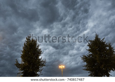 the sky is covered with gray clouds