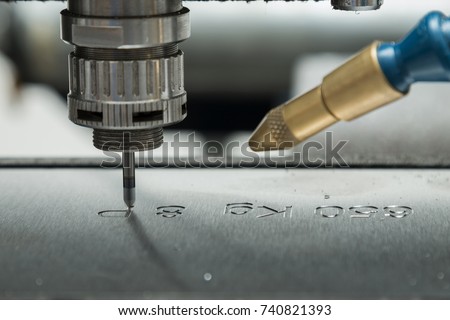 engraving machine steel blade Royalty-Free Stock Photo #740821393