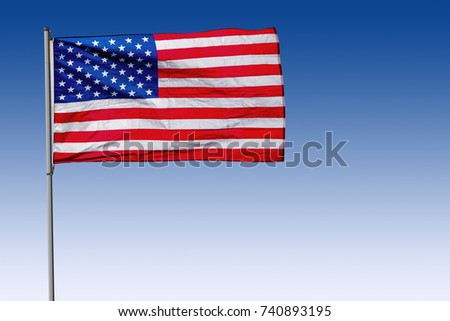 USA Flag on Pole with Blue Background