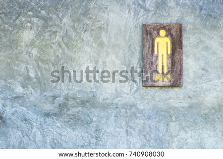 Toilet sign, symbol, made by old wooden paint by yellow color.