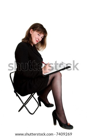 young businesswoman in black dress isolated on white
