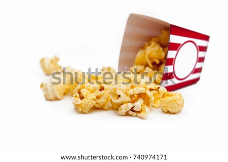 Popcorn in a box on a white background.