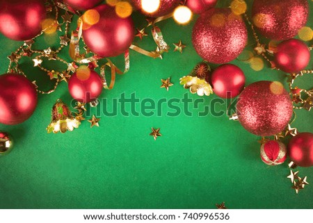 Red Christmas Baubles on Green Background 