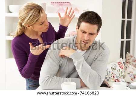Couple Having Argument At Home Royalty-Free Stock Photo #74106820
