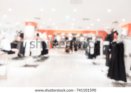 Abstract blur and defocused shopping mall in department store interior for background