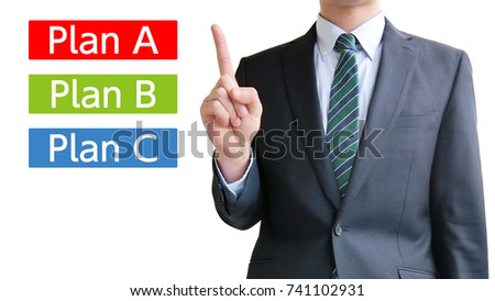 Business man pointing plan select