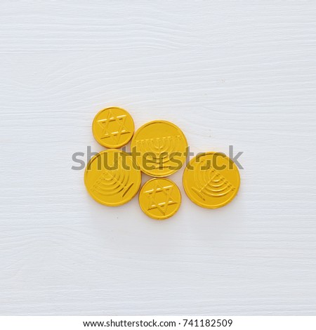 jewish holiday Hanukkah image background with traditional chocolate coins.