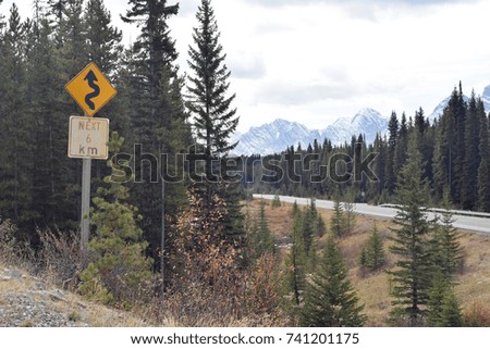 Winding Road Sign on a Canadian Rocky Mountain Highway in Kananaskis, Alberta