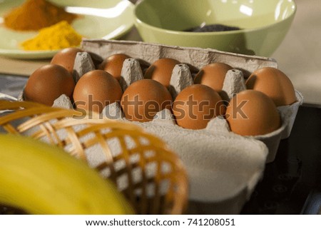 Chicken eggs in a box.
