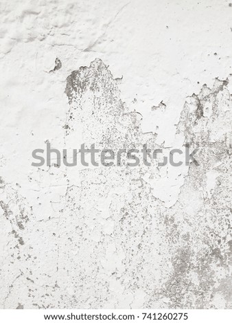 Closed up of abstract cracked grunge peeling painted wall background 