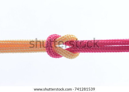 String knotted on a white background


