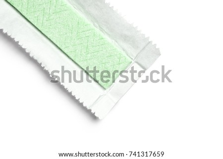 Chewing gum plate wrapped in foil isolated on white background