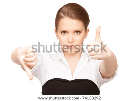 bright picture of lovely teenage girl with thumbs up and thumbs down