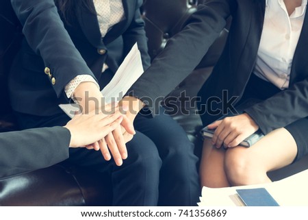 Close up of diverse business people group showing teamwork and overlapping hands together, Businessman and businesswoman putting hand together to be one heart and one mind,teamwork and success concept