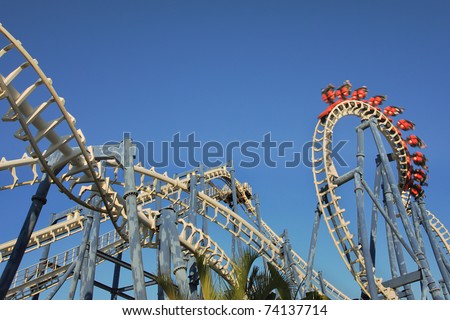 Roller coaster loop in Luna Park, Tel Aviv. Royalty-Free Stock Photo #74137714