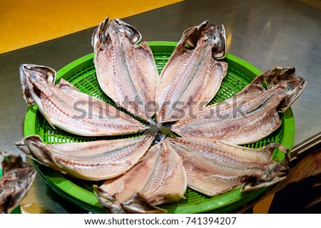 Cut of fish in street market Royalty-Free Stock Photo #741394207