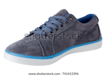 Children's and adult shoes on a white background