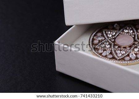 jewelry holder with fashion piece inside