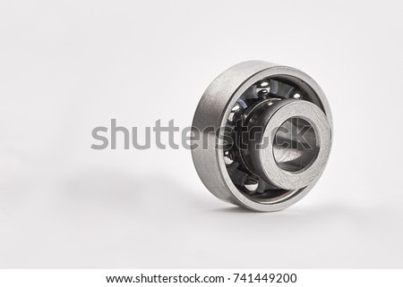 New replacement Roller Skate Bearings isolated on white background. Standard ABEC7 type bearings for inline skates, skateboards or scooters.  built-in spacers on a white background