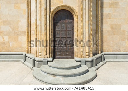 Old iron door entrance in georgian church.