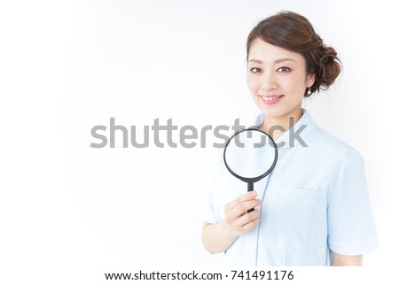 Nurse with loupe
