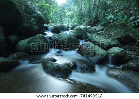scenery of waterfall at Liang Waterfall,Perak,Malaysia. soft focus,motion blur due to long exposure.