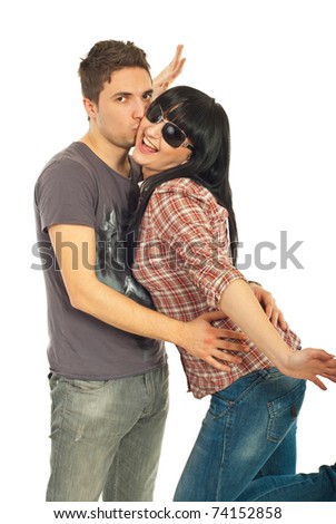 Loving young trendy couple isolated on white background