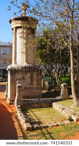 Photo of iconic and picturesque Choragic Monument of Lysicrates , Plaka district, Athens historic center, Attica, Greece          