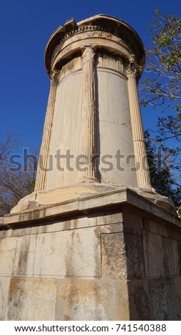 Photo of iconic and picturesque Choragic Monument of Lysicrates , Plaka district, Athens historic center, Attica, Greece          