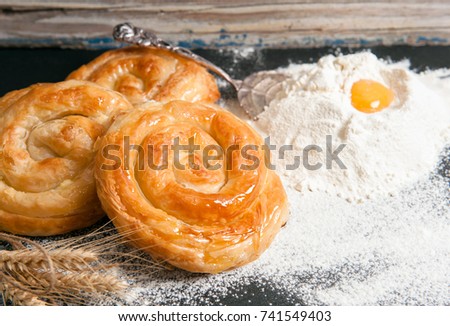 Bakery background – home made cheese pie on black board