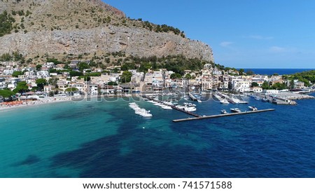 Aerial bird view photo Mondello marina showing small recreational boats in harbor Mondello is small borough of city of Palermo in autonomous region of Sicily in Southern Italy beautiful Azurevwater