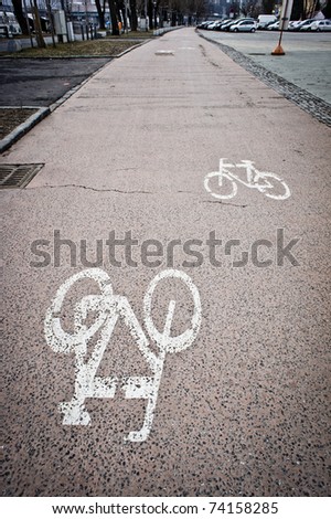 Painted cycle lane warning sign for pedestrians