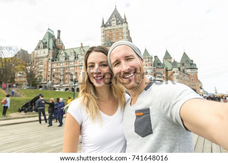 A Couple in front of Chateau Frontenac at Quebec city Canada