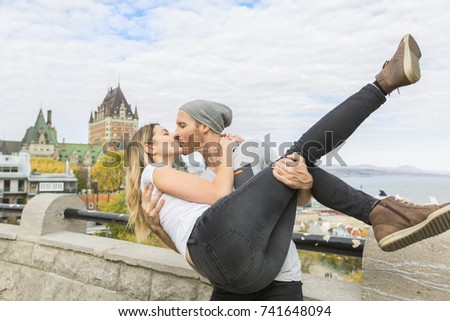 A Couple in front of Chateau Frontenac at Quebec city Canada