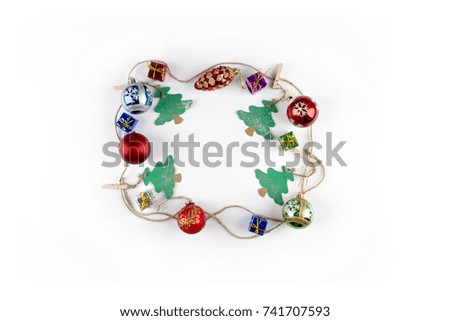 "Merry Christmas and Happy New Year"- Four green Christmas trees with red round toys and small gifts on the pure white background
