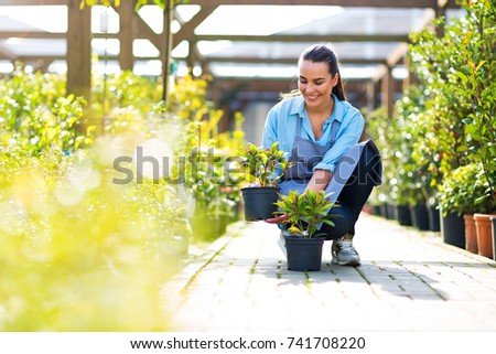 Woman working in garden center
