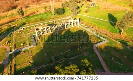Aerial drone bird's eye view of iconic Temple of Artemis in archaeological site of Vravrona or Brauron, Attica, Greece