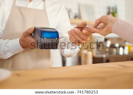 Close up of a credit card being used for payment