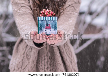 Girl Holding Holiday Gift