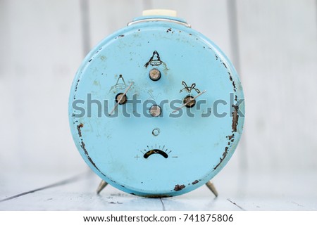 Old Sad Blue Alarm Clock