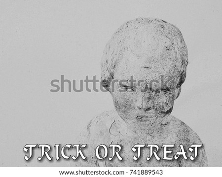 old sculpture with word "TRICK OR TREAT"(back and white picture)